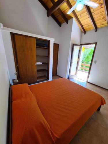 Llit o llits en una habitació de Acuarela