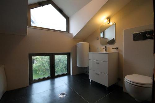 Vonios kambarys apgyvendinimo įstaigoje Domador Rooms & Apartments