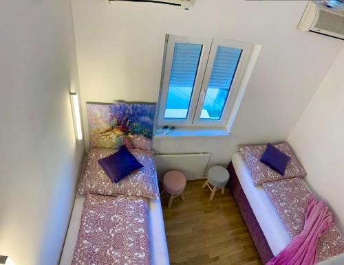 Posteľ alebo postele v izbe v ubytovaní Appartements Belli
