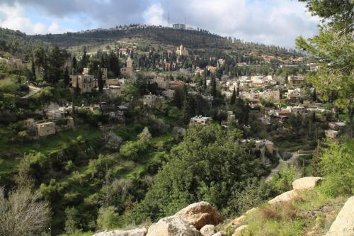 a view of a city from a hill at Khan Ein Karem Boutique Hotel in Jerusalem