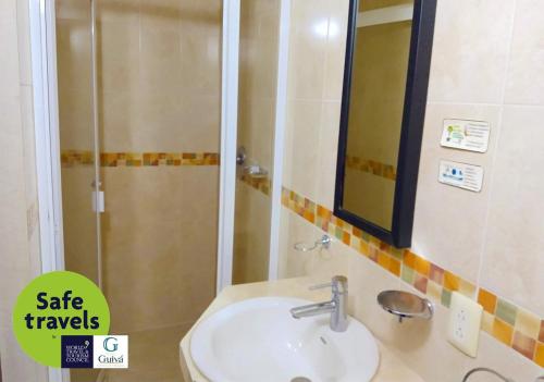 Koupelna v ubytování Hotel Guivá Huatulco