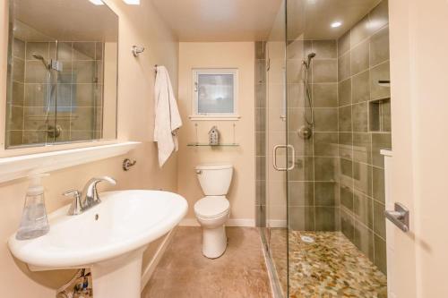 a bathroom with a sink toilet and a shower at Ocean & Mountain View Home - Walk to Trails Beach Family Activities in Montara