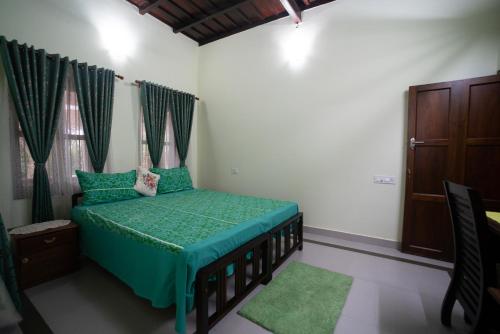 Katil atau katil-katil dalam bilik di Achadipura Homestay