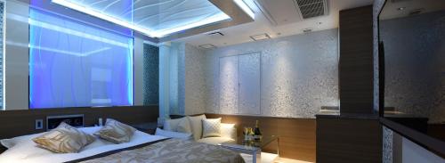 Postel nebo postele na pokoji v ubytování HOTEL W-PARTY-W GROUP HOTELS and RESORTS-