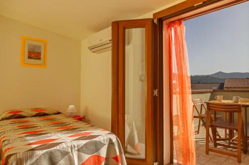 Ένα ή περισσότερα κρεβάτια σε δωμάτιο στο CASA DORIA