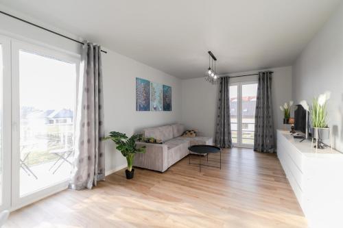 Postel nebo postele na pokoji v ubytování Apartament Skandynawski z balkonem - Dream Apart