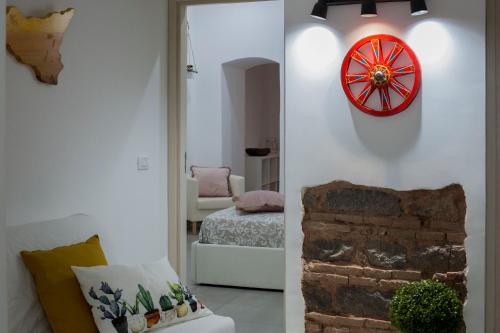 A bed or beds in a room at Al Cortile del Re Luxury Home