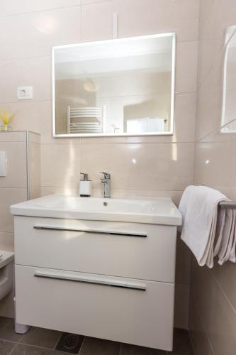 Ένα μπάνιο στο Apartmani Villa Paulo