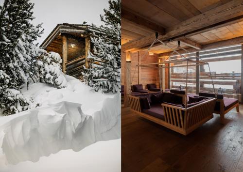 a room with a christmas tree and a room with couches at Maiensässhotel Guarda Val in Lenzerheide