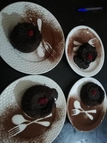 a group of three plates of food with chocolate at Hotel School Ersat Azrou in Azrou