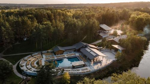 an aerial view of a resort with a large swimming pool at Мис Доброї Надії Полтава in Hlody