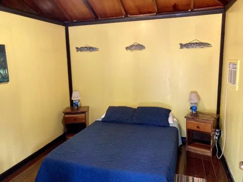 Giường trong phòng chung tại Lost Reef Resort