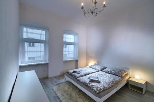 Posteľ alebo postele v izbe v ubytovaní Apartmán BB centrum
