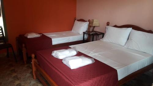 Alto Del Valle Cafayate tesisinde bir odada yatak veya yataklar