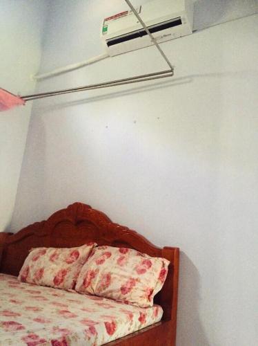 Ένα ή περισσότερα κρεβάτια σε δωμάτιο στο HOMESTAY LOAN ANH