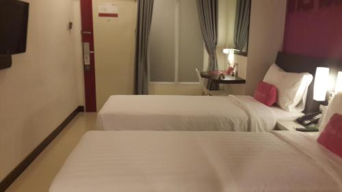 Katil atau katil-katil dalam bilik di favehotel Pluit Junction
