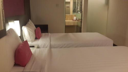 Katil atau katil-katil dalam bilik di favehotel Pluit Junction