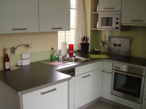 Nhà bếp/bếp nhỏ tại Ferienhaus Kamerun an der Elbe - CASA KAMERUNSCHAF