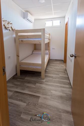Katil atau katil-katil dalam bilik di Albergue Multiaventura Active Andalucia