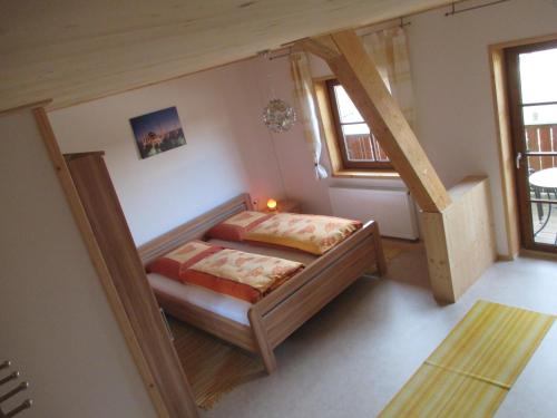 מיטה או מיטות בחדר ב-Bärenhof