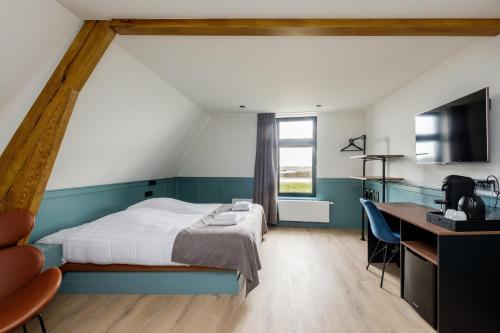 Postel nebo postele na pokoji v ubytování Hotel Brasserie Smits