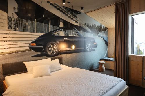 Ένα ή περισσότερα κρεβάτια σε δωμάτιο στο elferrooms Hotel