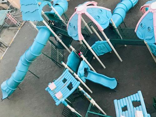 an aerial view of a water park ride at Milimani apartments10 in Nakuru