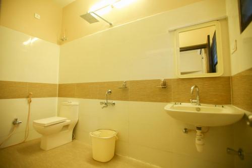 Kúpeľňa v ubytovaní Raj Residency Salem