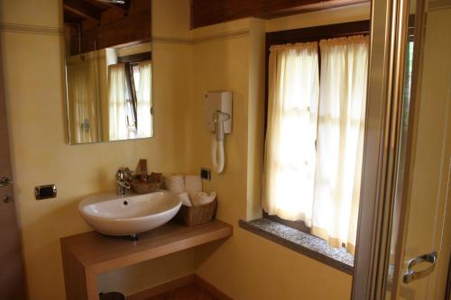 Vonios kambarys apgyvendinimo įstaigoje Molino Del Torchio