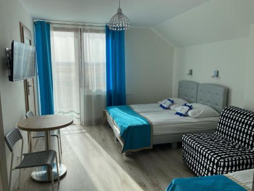 Posteľ alebo postele v izbe v ubytovaní Villa Laguna