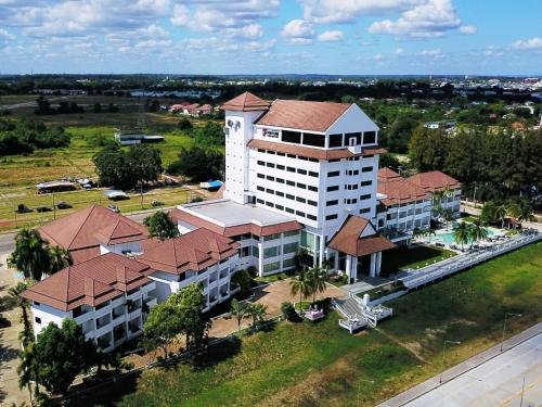 an overhead view of a large white building with a red roof at Fortune River View Hotel Nakhon Phanom in Nakhon Phanom