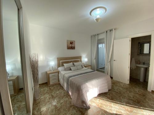 Säng eller sängar i ett rum på Sol mediterráneo
