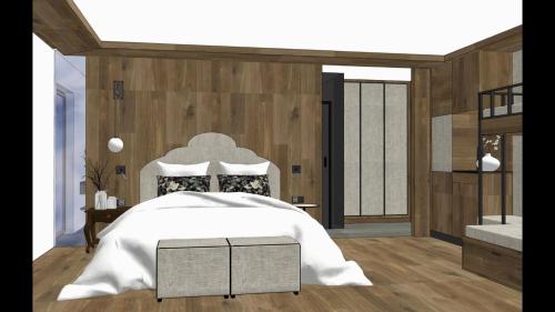 Una cama o camas en una habitación de Alpin Hotel Garni Eder - Private Living