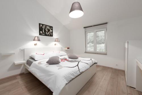 A bed or beds in a room at Kuća za odmor Diraki