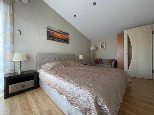 Postel nebo postele na pokoji v ubytování Villa Irina Palanga