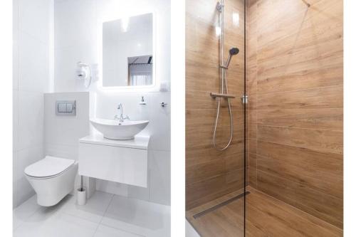 Kúpeľňa v ubytovaní HOUSEHOST Apartment: Miodowa 42/8b street