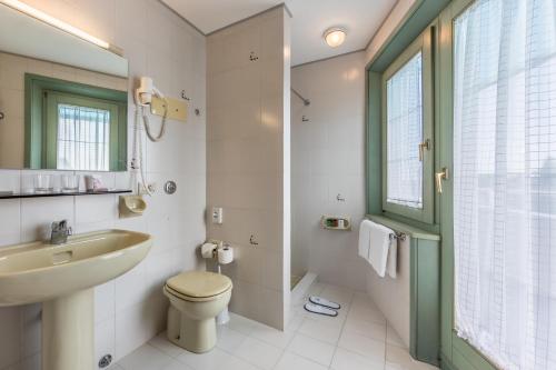 Un baño de Aviano Palace Hotel