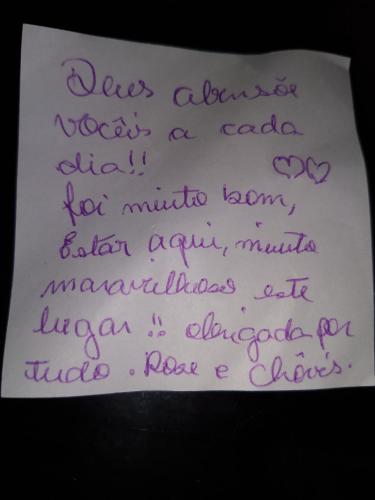 a piece of paper with purple handwriting on it at loft harmonia in Blumenau