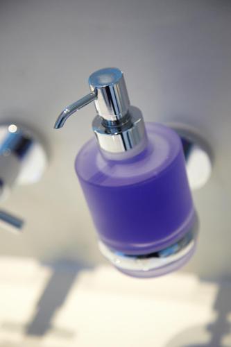 a close up of a purple bottle of toothpaste at Malmaison London in London