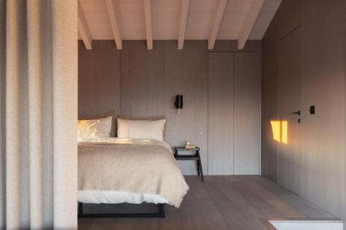 a bedroom with a bed and a side table at Radar by Bloom Stays in Littlestone-on-Sea