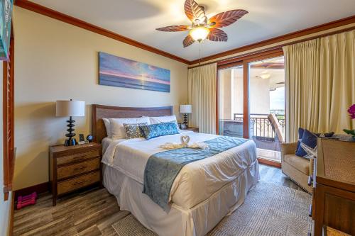 A bed or beds in a room at Luxurious Ocean View Beach Villa B-903 at Ko'Olina Beach Villas