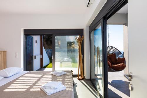 Ένα ή περισσότερα κρεβάτια σε δωμάτιο στο Villa Sea-Esta, Adults Only