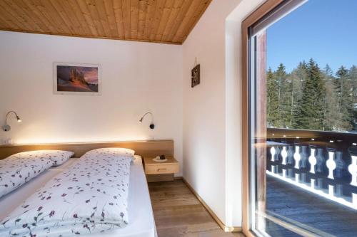 Posteľ alebo postele v izbe v ubytovaní Ferienwohnung Kesselberg Edelweiss