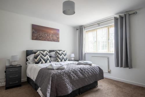 a bedroom with a bed and a window at No10 Nursery Convent in Mansfield