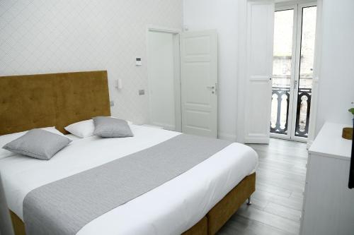 Letto o letti in una camera di Duomo Platinum Apartments