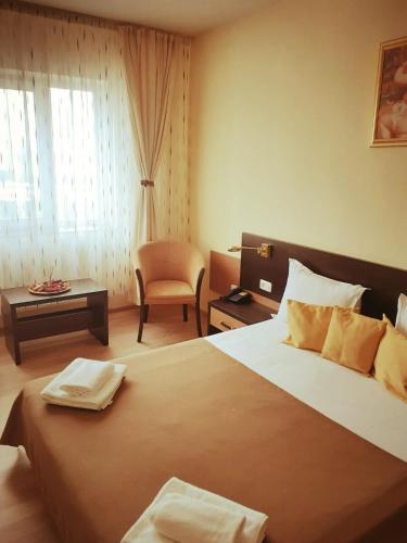 Postel nebo postele na pokoji v ubytování Hotel Nord