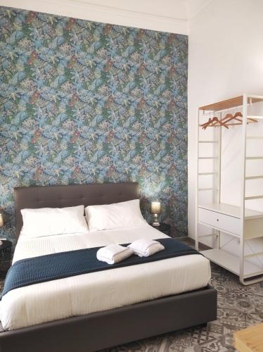 Katil atau katil-katil dalam bilik di B&B Casa Carola