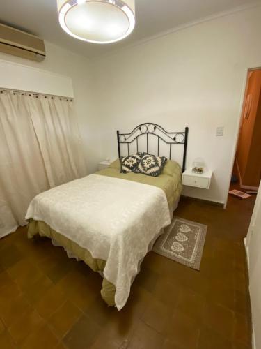 Ένα ή περισσότερα κρεβάτια σε δωμάτιο στο casa Muñiz