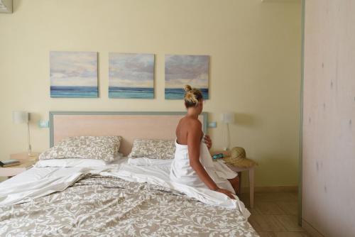 Letto o letti in una camera di Onda Marina Residence Rta