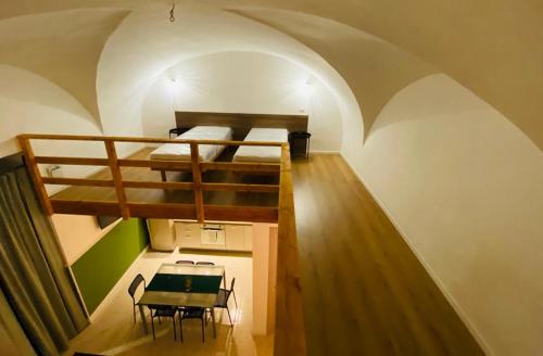 A bed or beds in a room at Il Vicolo Home 2